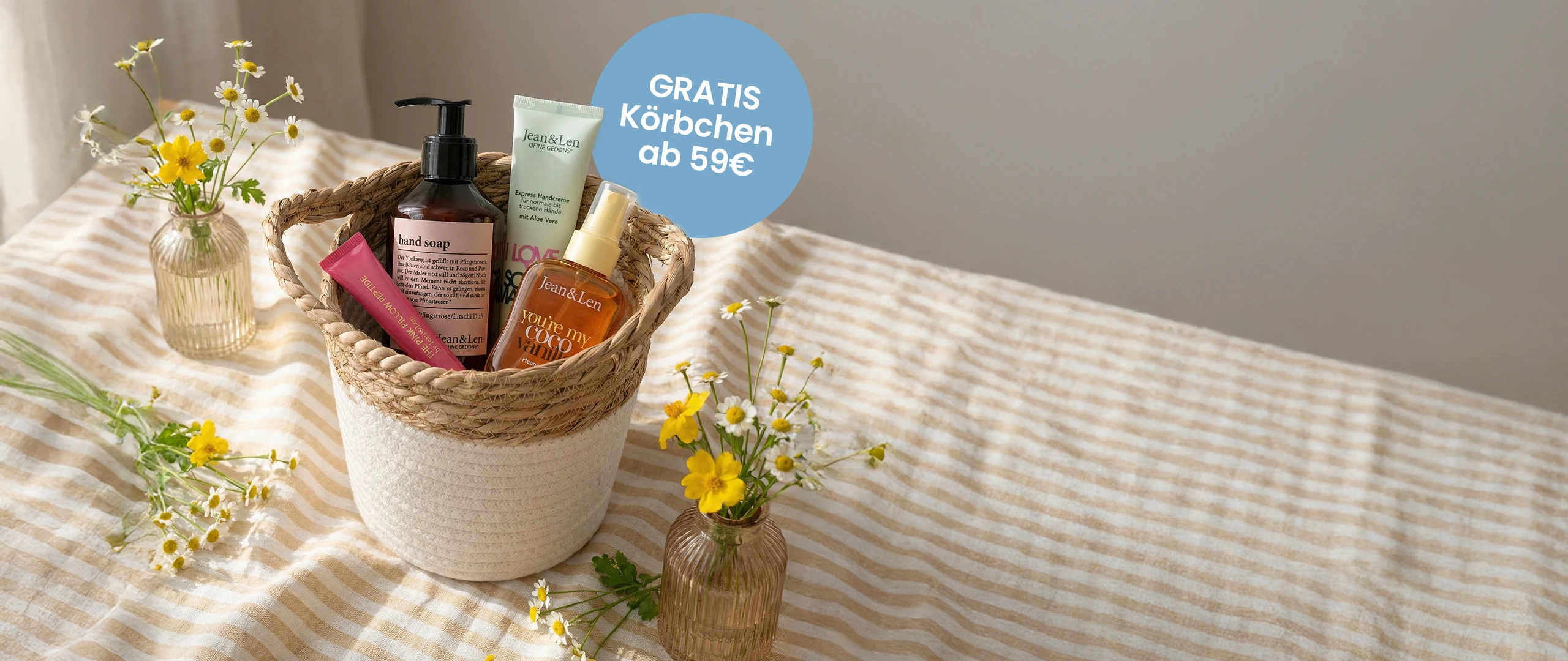 Werbebanner für den Fresh Spring Sale mit Hinweis 15% auf alles mit Code SPRINGSALE15 und Jean&Len-Produkte mit reduzierten Preisen.