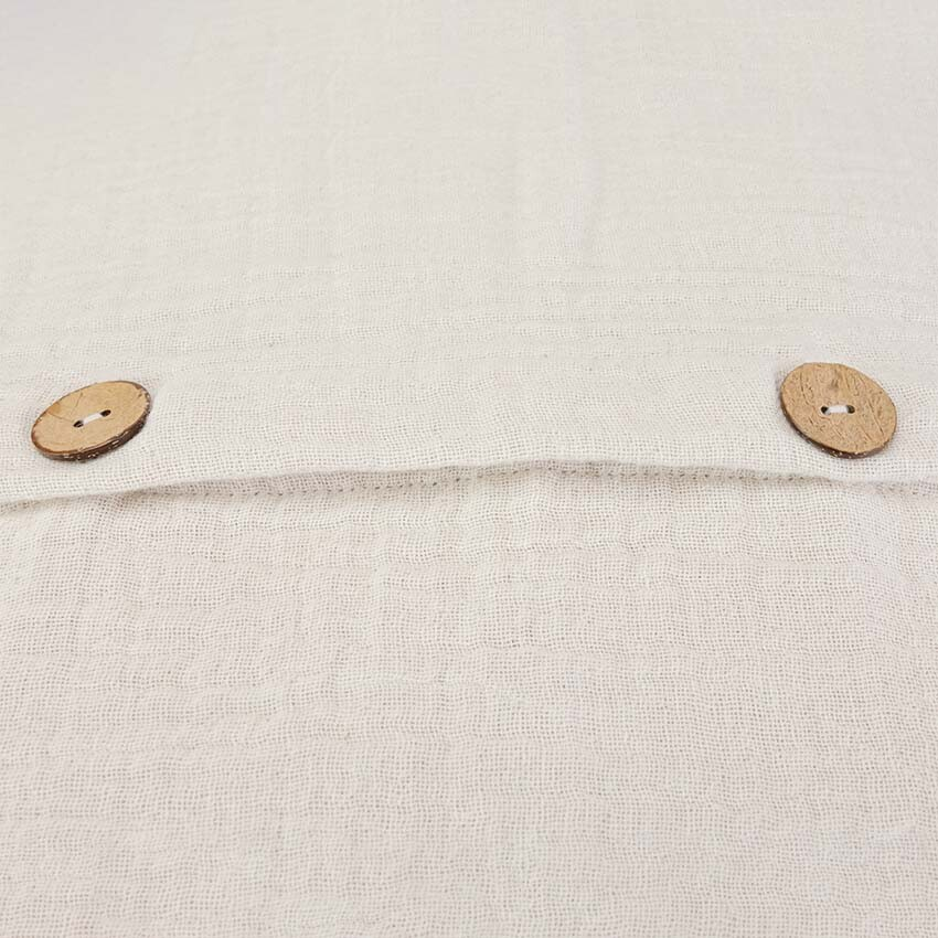Kissen-Kokosknoepfe-Detail-ecru